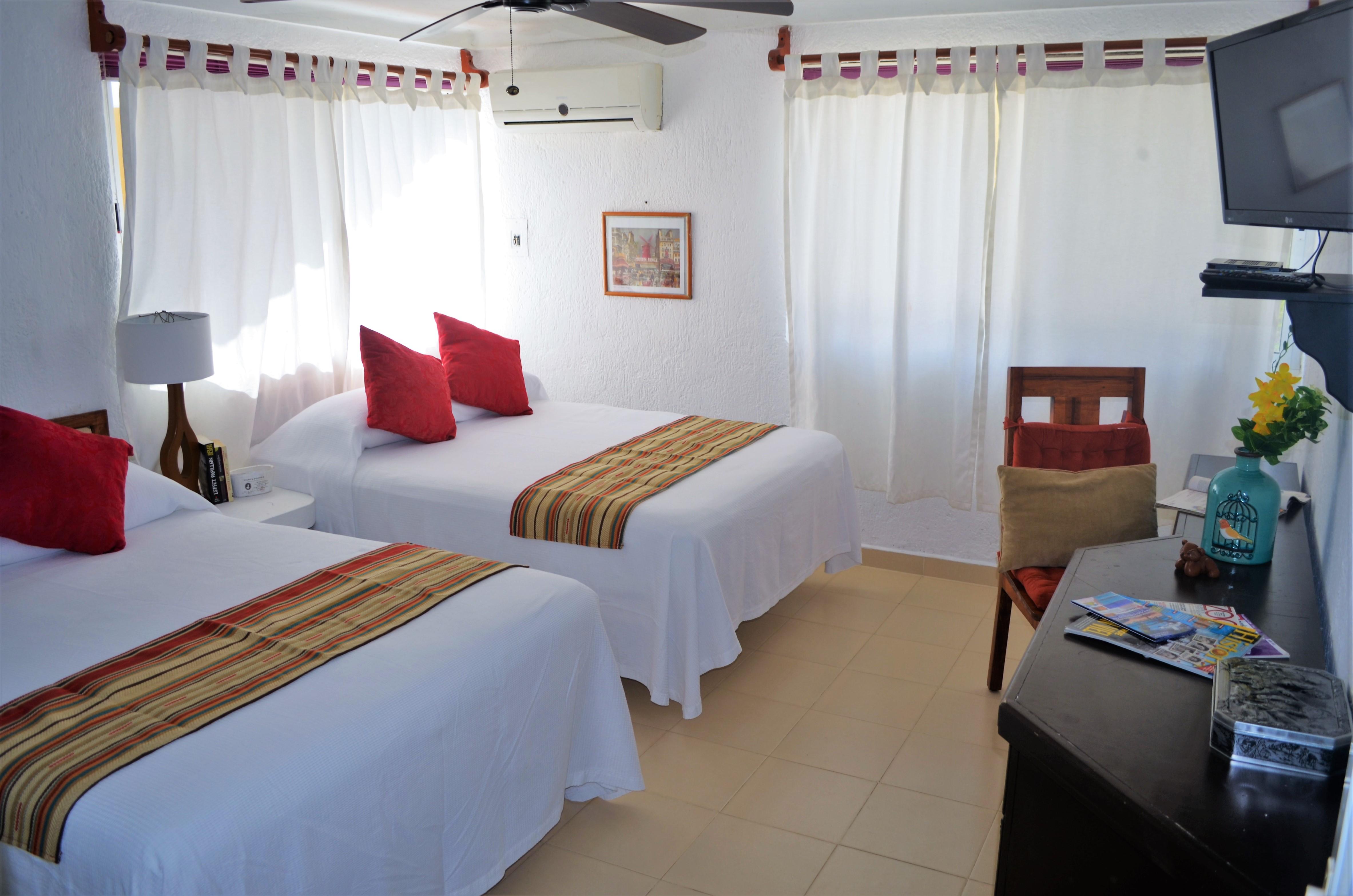Arrecifes Suites ปัวร์โตโมเรลอส ภายนอก รูปภาพ
