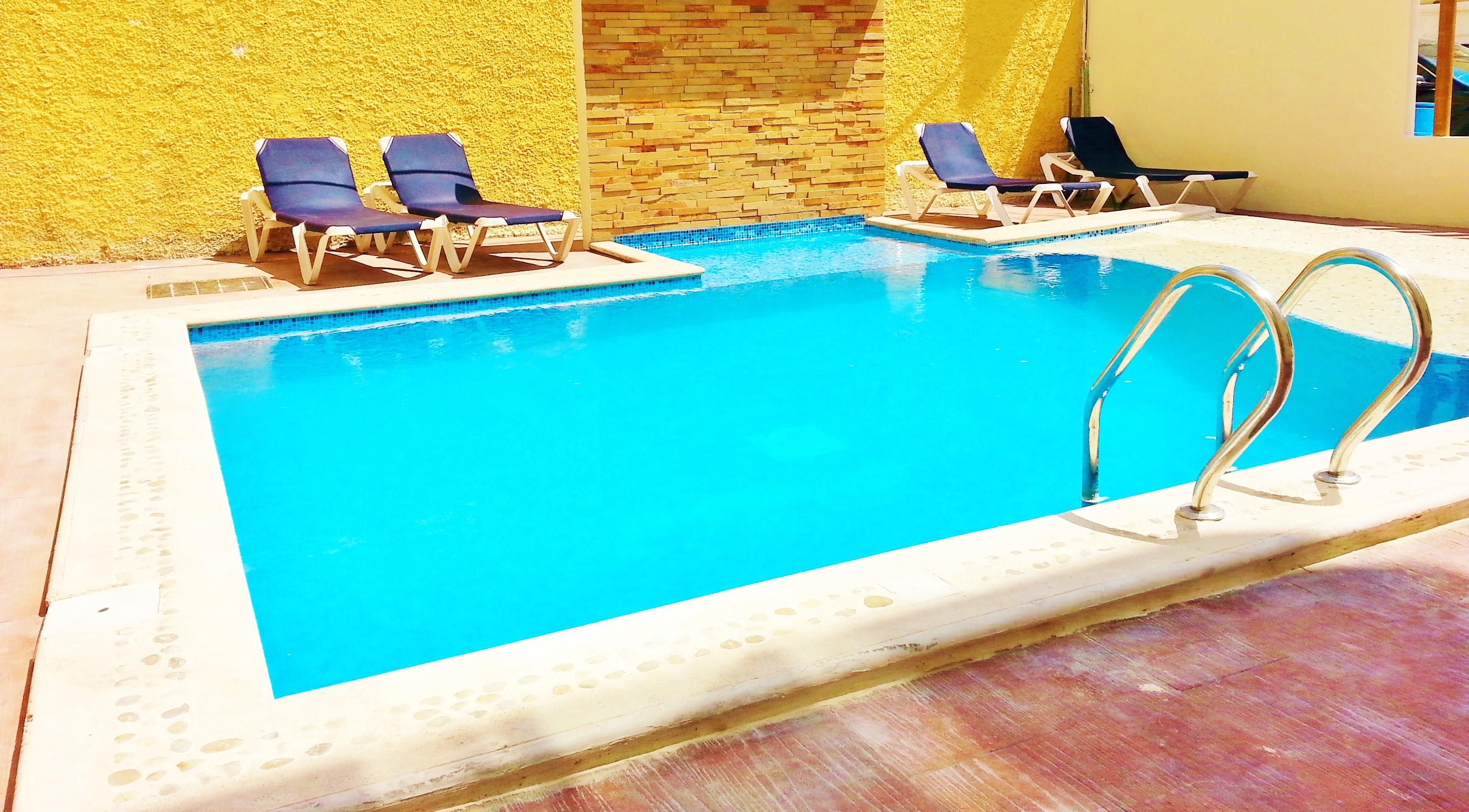 Arrecifes Suites ปัวร์โตโมเรลอส ภายนอก รูปภาพ