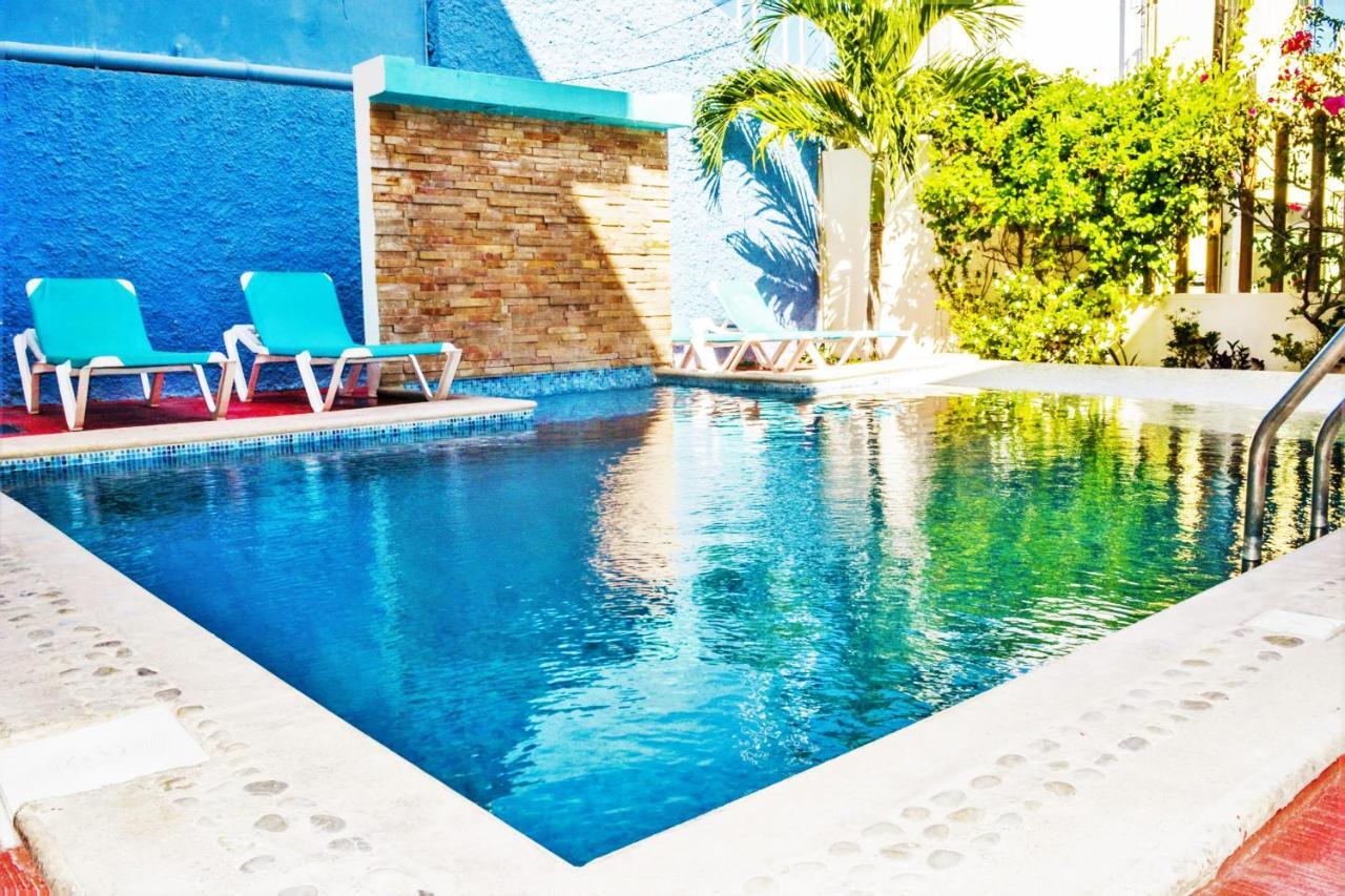 Arrecifes Suites ปัวร์โตโมเรลอส ภายนอก รูปภาพ
